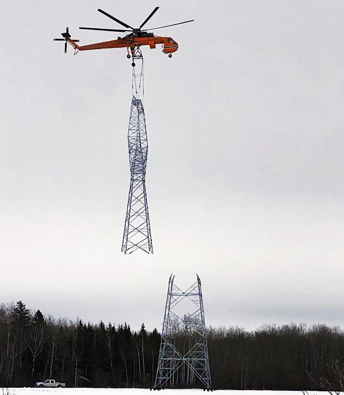 Tower assembly using a helicopter.